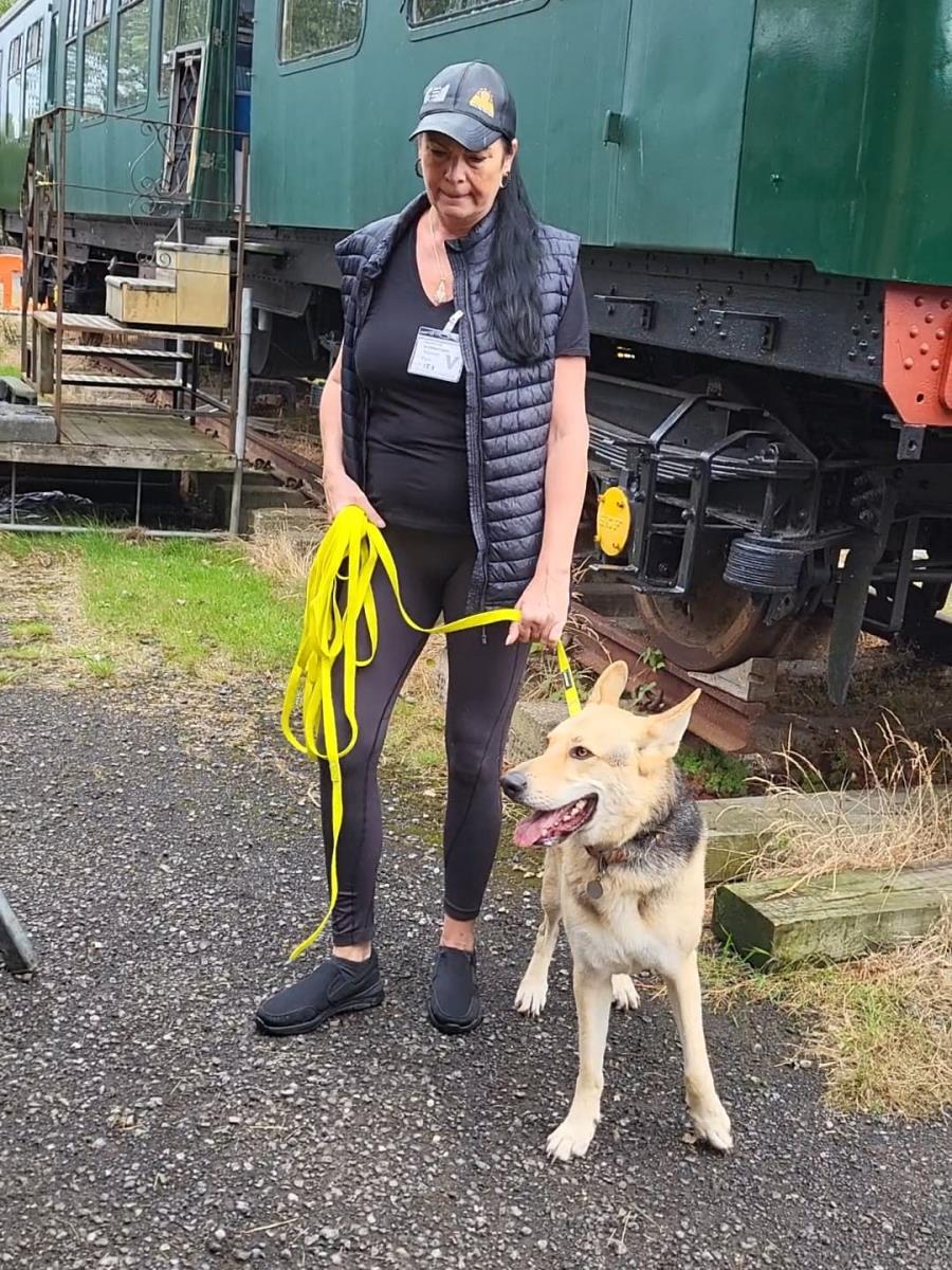 Bev with her Alsatian rescue dog Leiki at our NPL site waiting to begin a search of our workshops.