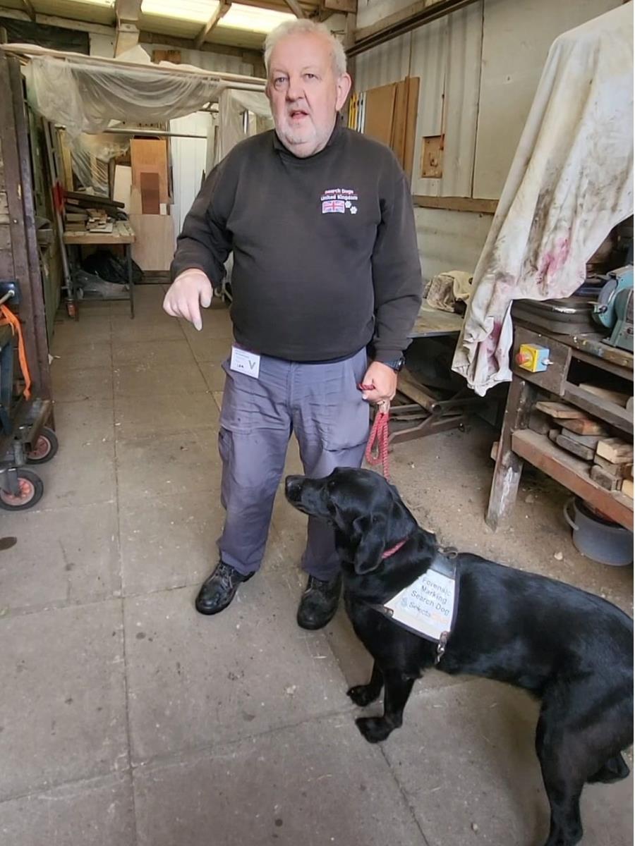 Mick and his black labrador Cody lead the training.